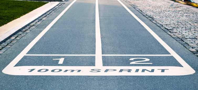 Road marked with 100m sprint and 2 run lanes.