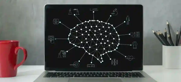 Laptop screen with a diagram of AI and the industries it impacts.